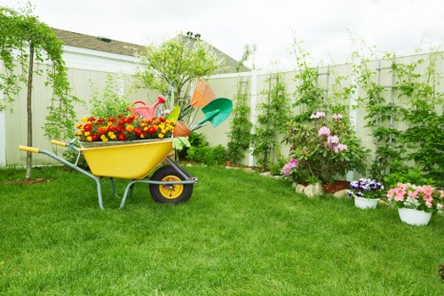 Trained landscaper using PPE on a Richmond upon Thames garden site