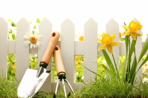 Garden maintenance in Richmonduponthames with tidy lawn and hedges